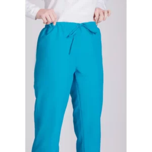 Pantalón antilejía unisex Norvil 1719 en turquesa, vista frontal, sobre modelo y encuadre parcial.
