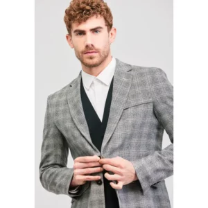 Americana unisex artia Norvil 3174 en cuadro negro/beige, vista frontal, sobre modelo.