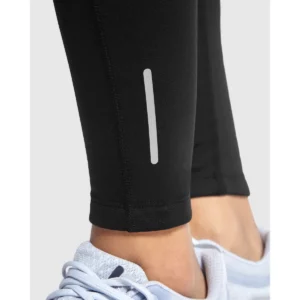 Malla larga running mujer Roly Adelaida 0459, negro, detalle del bajo con modelo