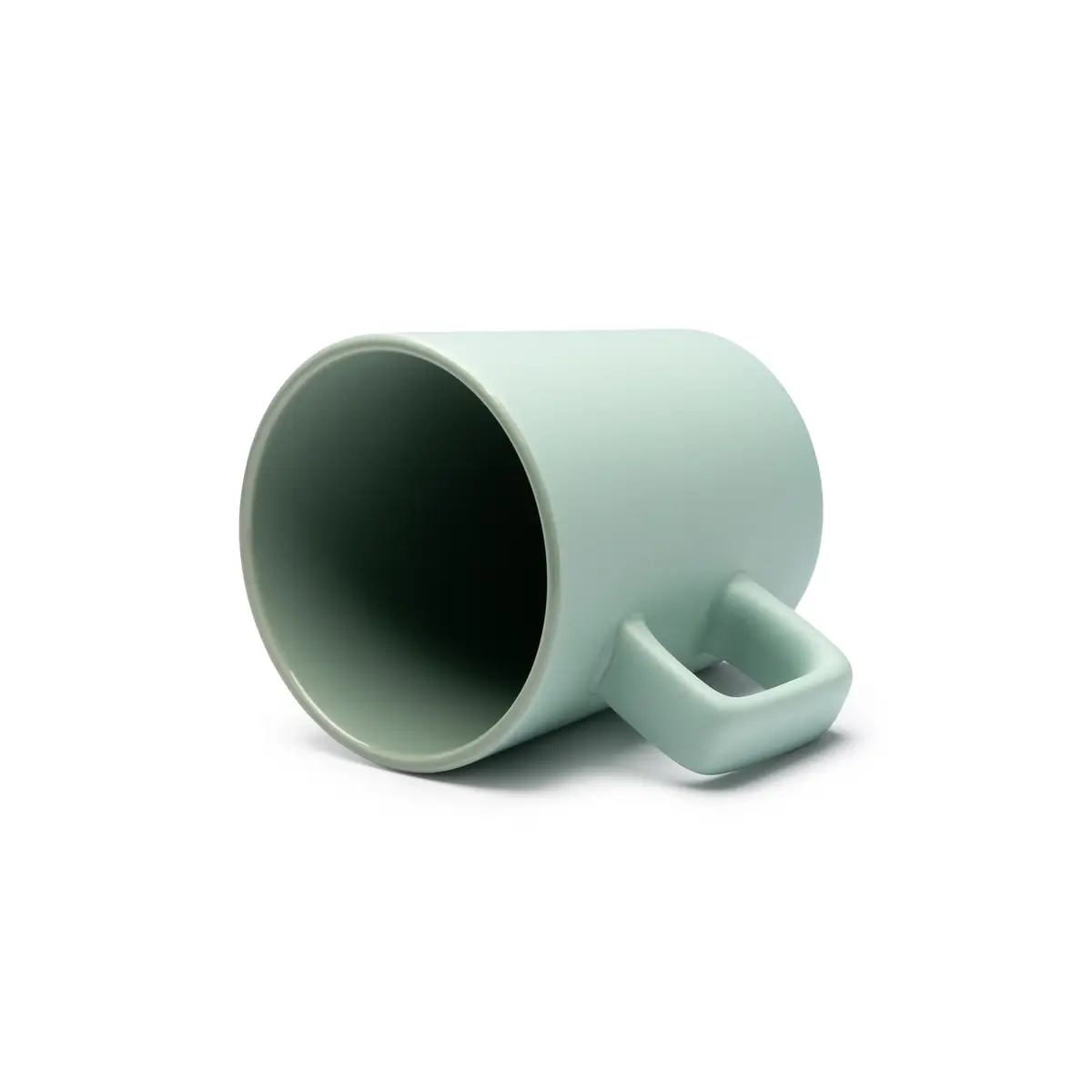 Taza de cerámica mate Stamina Galvan 1133 6 Taza de cerámica mate Stamina Galvan 1133, verde salvia, vista de la taza tumbada con el interior visible
