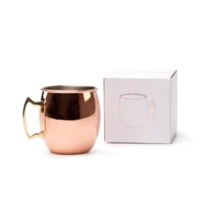 Taza de acero Stamina Keila 1161, cobre, vista de la taza junto a su caja de diseño