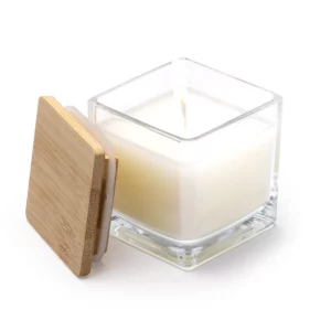 Vela aromática Stamina Rocix 1171, blanco, vista de la vela abierta con la tapa apoyada