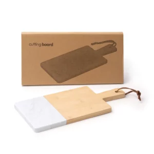 Tabla de bambú y mármol Stamina Gino 1386, crudo, vista de la tabla junto a la caja kraft
