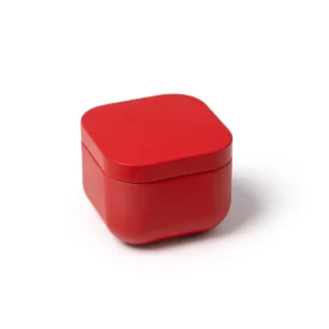 Vela aromática Stamina Trini 1528, rojo, vista del recipiente rojo cerrado en perspectiva