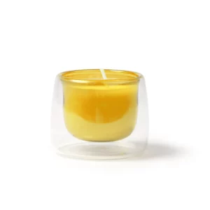Vela aromática Stamina Flora 1530, amarillo, vista frontal de la vela