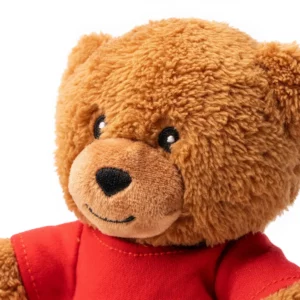 Pack de 10 peluches Stamina Koda 1548, camiseta en rojo, detalle del rostro y la camiseta roja