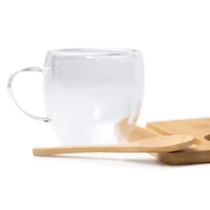 Set de taza y posavasos Stamina Blumon 1848, transparente, detalle de la taza, la cuchara y el posavasos
