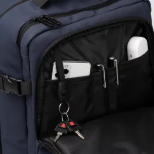 Mochila extensible Stamina Oregon 1883, marino, detalle del bolsillo organizador con accesorios como ejemplo de uso