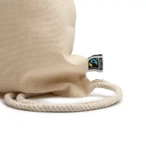 Mochila de algodón Stamina Barone 7085, crudo, detalle de la etiqueta lateral y de los cordones