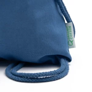 Mochila de algodón Stamina Brest 7087, azul riviera, detalle de la etiqueta lateral y de los cordones