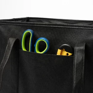 Organizador de maletero Stamina Rifter 7169, negro, detalle del bolsillo frontal con objetos como ejemplo de uso