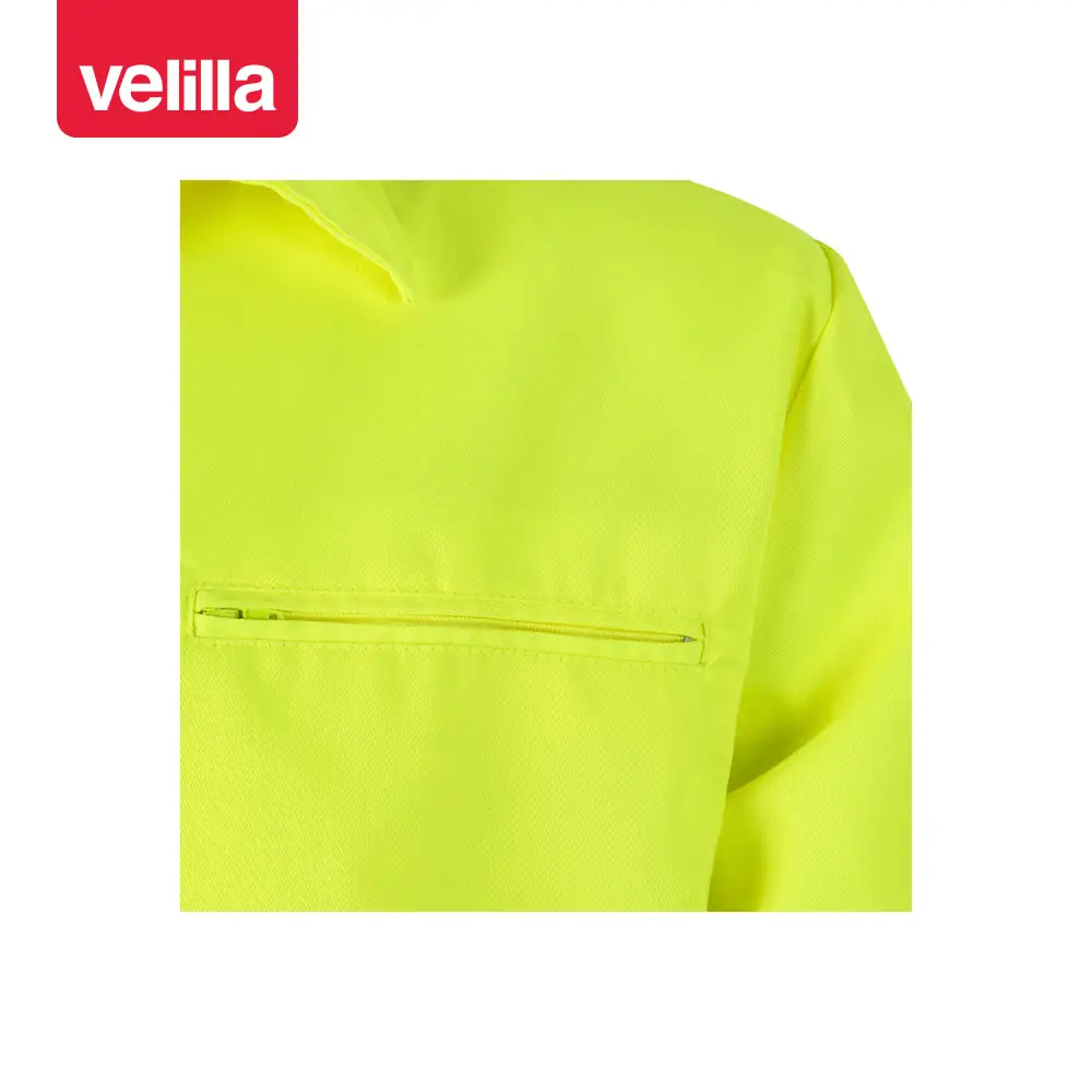 Cazadora bicolor reflectante Velilla 153 23 Cazadora bicolor reflectante Velilla 153 Azul marino/Amarillo flúor, detalle de bolsillo del pecho