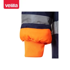 Parka bicolor alta visibilidad Velilla 166 Azul marino/Naranja flúor, detalle de puño