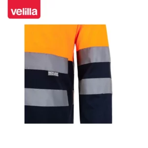 Polo bicolor alta visibilidad Velilla 175 Azul marino/Naranja flúor, detalle de cintas reflectantes