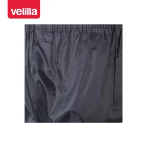 Traje de lluvia con capucha oculta Velilla 195 Azul marino, detalle de cierre del pantalón