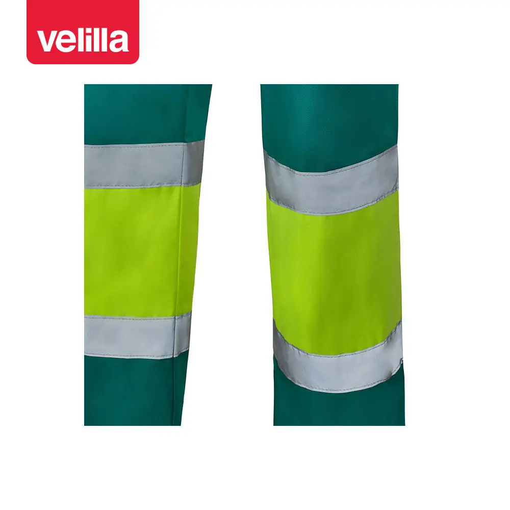 Pantalón bicolor Velilla 303003 16 Pantalón bicolor Velilla 303003 Verde/Amarillo flúor, detalle de cintas reflectantes