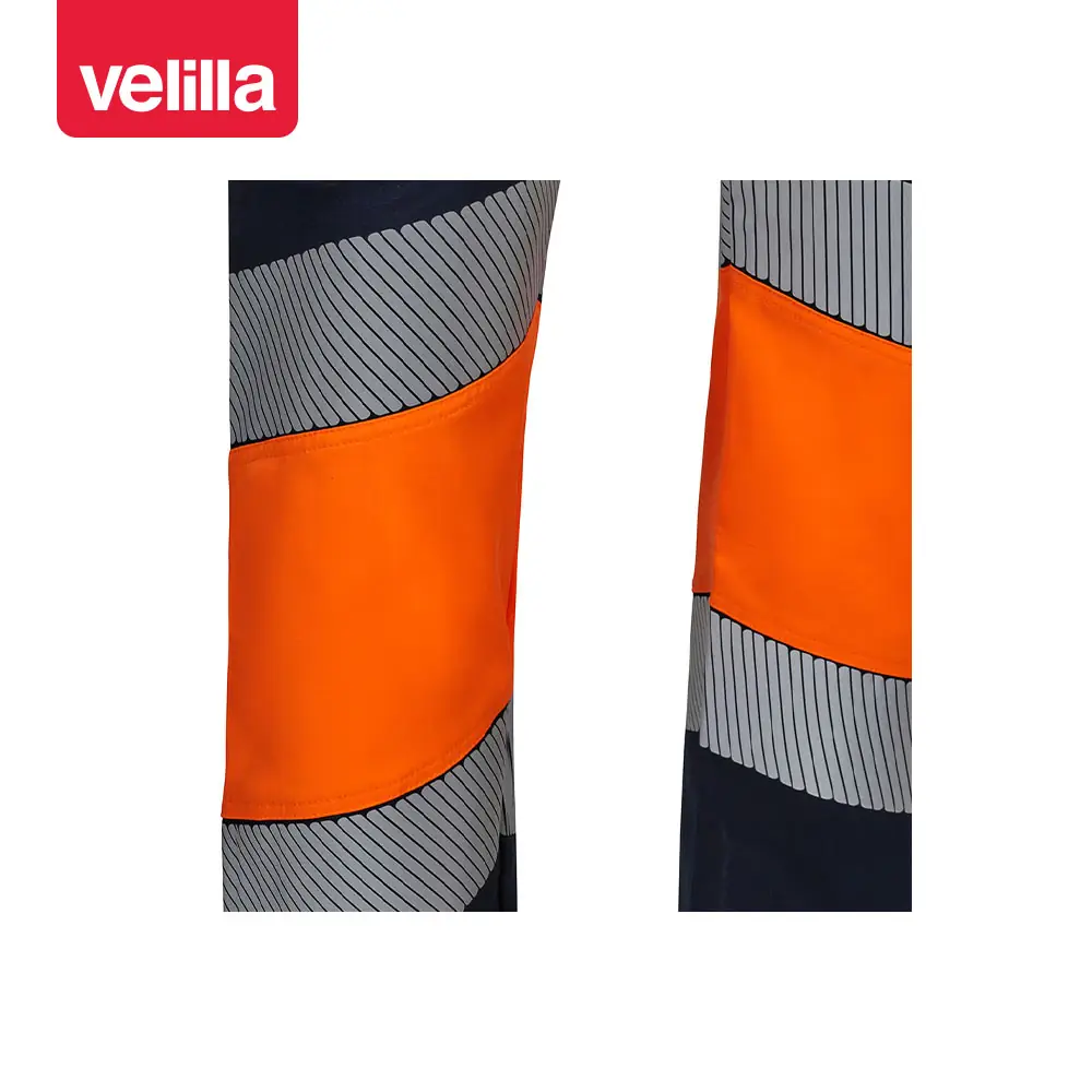Pantalón bicolor segmentado Velilla 303008S 16 Pantalón bicolor segmentado Velilla 303008S Azul navy/Naranja flúor, detalle de cintas reflectantes segmentadas