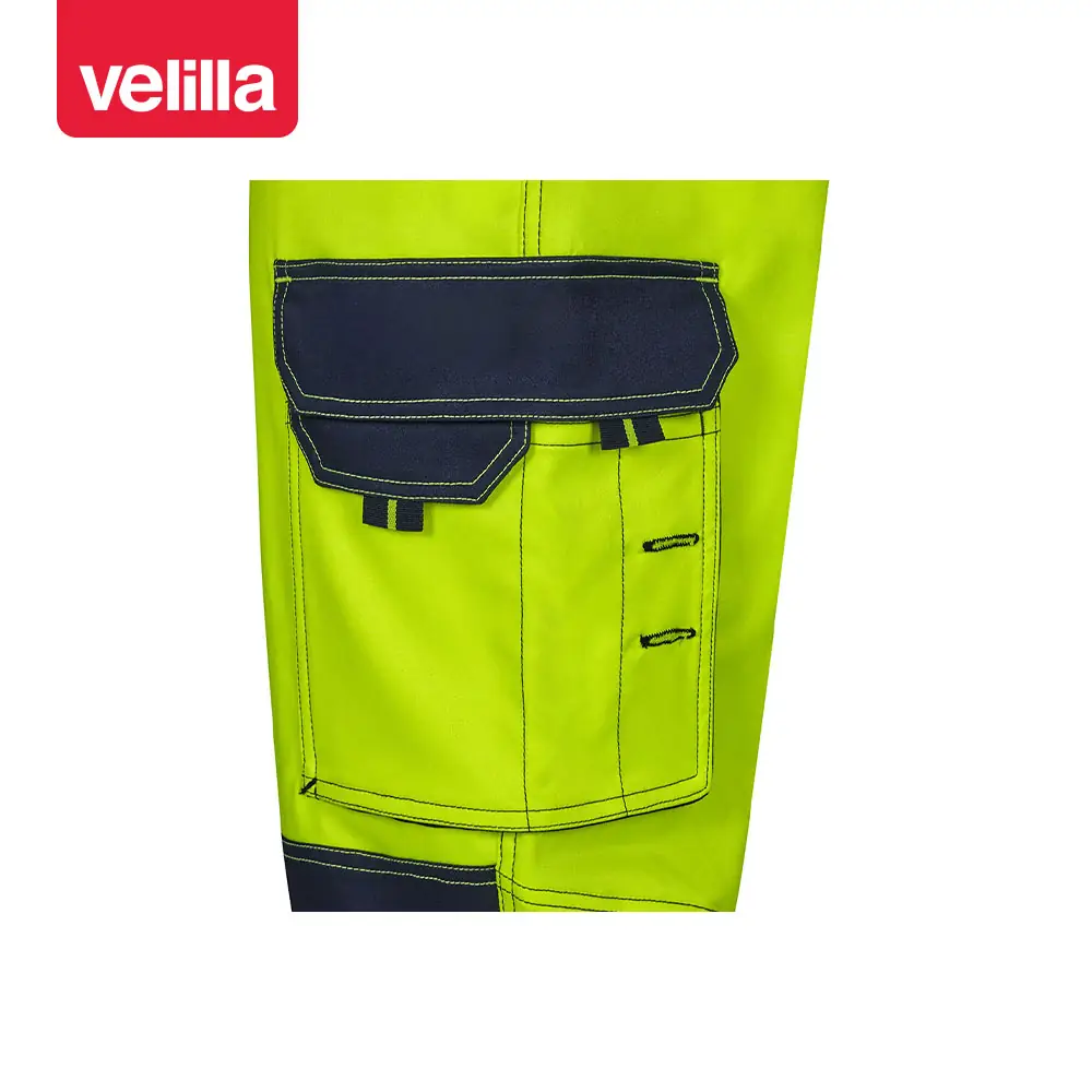 Pantalón stretch con rodilleras Velilla 303010S 7 Pantalón stretch con rodilleras Velilla 303010S Azul navy/Amarillo flúor, detalle de bolsillo lateral