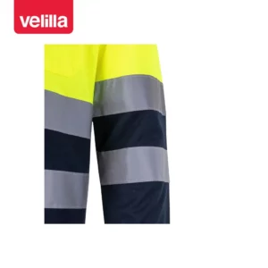 Polo bicolor manga larga Velilla 305507 Azul marino/Amarillo flúor, detalle de cintas reflectantes