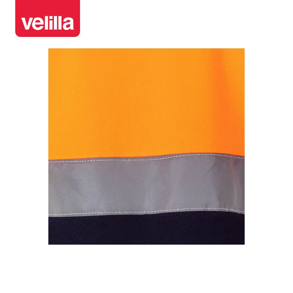 Polo bicolor manga corta Velilla 305513 28 Polo bicolor manga corta Velilla 305513 Azul navy/Naranja flúor, detalle de cinta reflectante