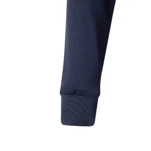 Polo bicolor manga larga Velilla 305545 Azul navy/Naranja flúor, detalle de puño
