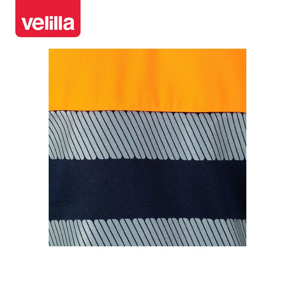 Sudadera bicolor Velilla 305703 con media cremallera 16 Sudadera bicolor Velilla 305703 con media cremallera Azul navy/Naranja flúor, detalle de cintas reflectantes