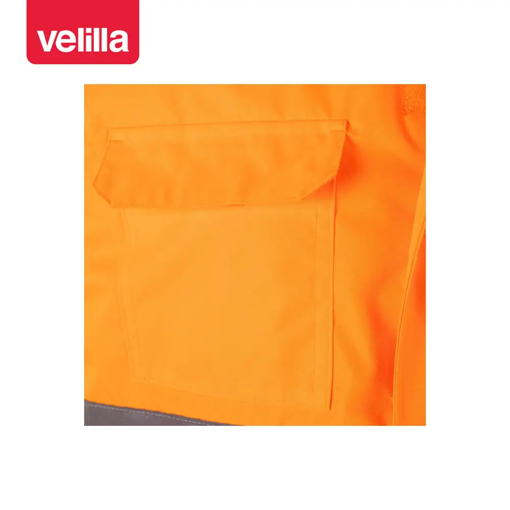 Chaleco acolchado bicolor Velilla 305902 11 Chaleco acolchado bicolor Velilla 305902 Azul navy/Naranja flúor, detalle de bolsillo del pecho