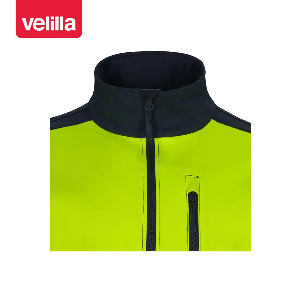 Cazadora softshell bicolor Velilla 306006 15 Cazadora softshell bicolor Velilla 306006 Azul navy/Amarillo flúor, detalle de cuello y cremalleras