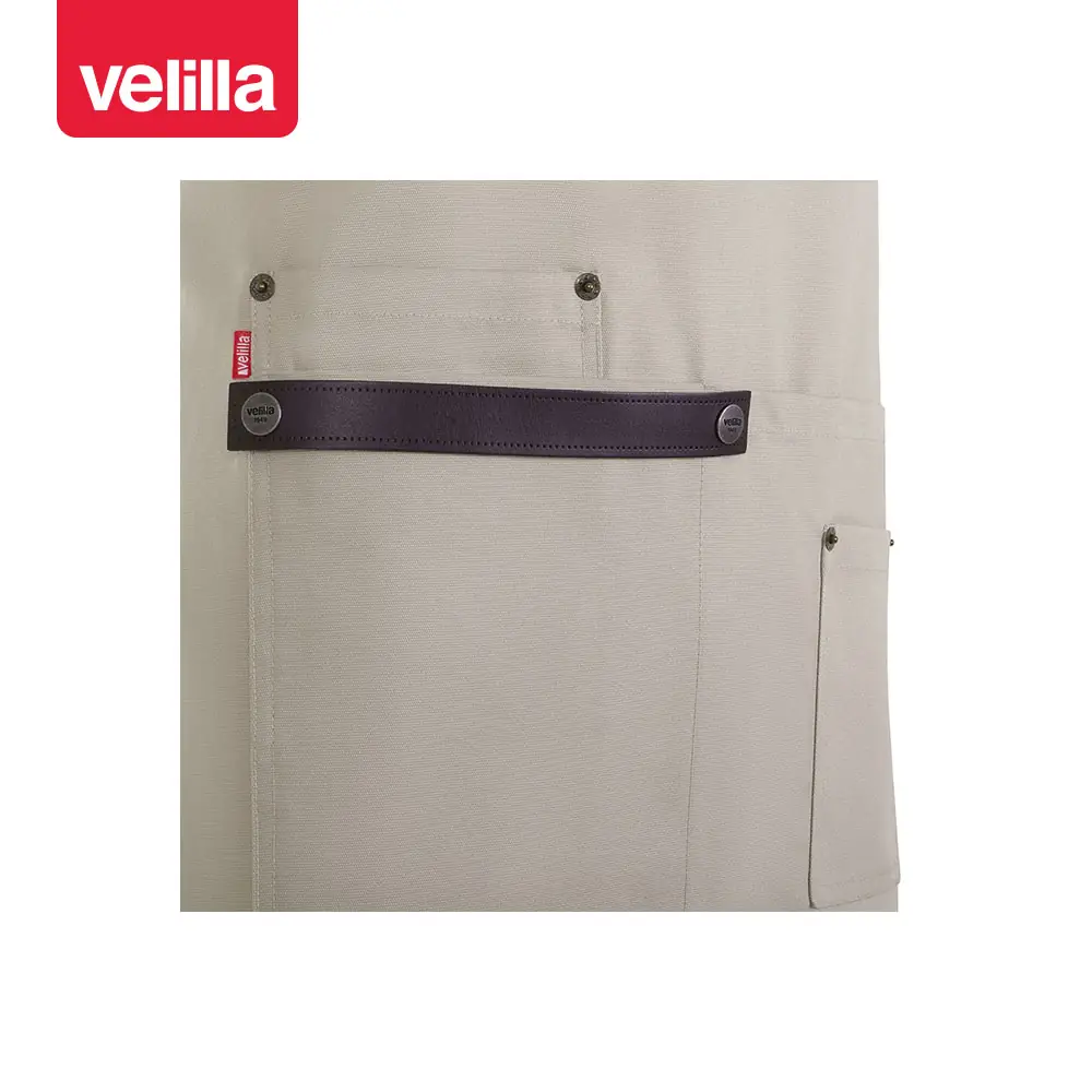 Delantal con peto Velilla MEZCAL 404215 21 Delantal con peto Velilla MEZCAL 404215 Almendra, detalle de bolsillo y tira para paño