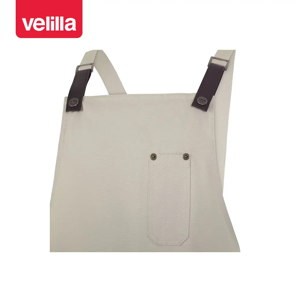 Delantal con peto Velilla MEZCAL 404215 22 Delantal con peto Velilla MEZCAL 404215 Almendra, detalle de peto y tiras de ajuste