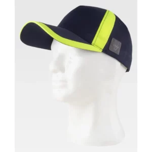 Gorra WorkTeam WFA944, Marino/Amarillo fluor, vista oblicua sobre maniquí